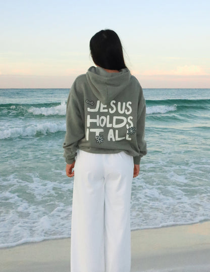 Jesus Holds It All Unisex Hoodie